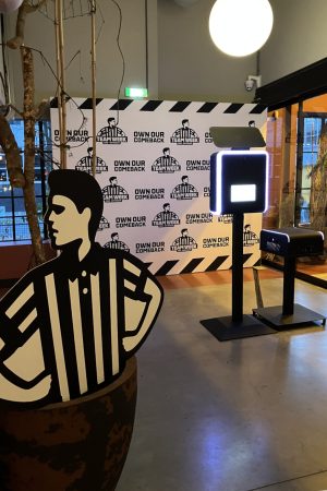 Branded photobooth with custom Foot Locker backdrop at a corporate team week event in the Netherlands - Smilen.nl