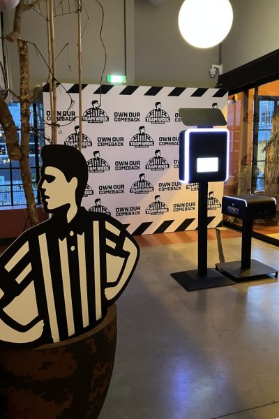 Branded photobooth with custom Foot Locker backdrop at a corporate team week event in the Netherlands - Smilen.nl